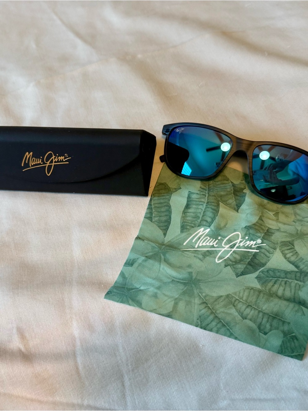 Maui Jim Lele Kawa polarized sunglasses, featuring the "Dragon's Tooth" design.